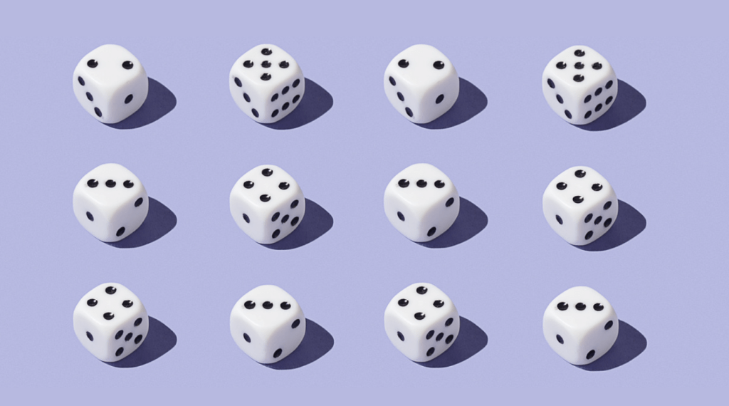 Twelve dice sitting on a light purple background in three rows of four.